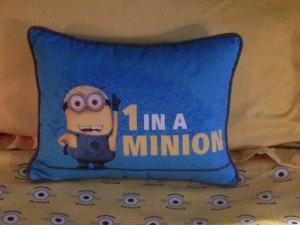 A Minion pillow sits on each bed