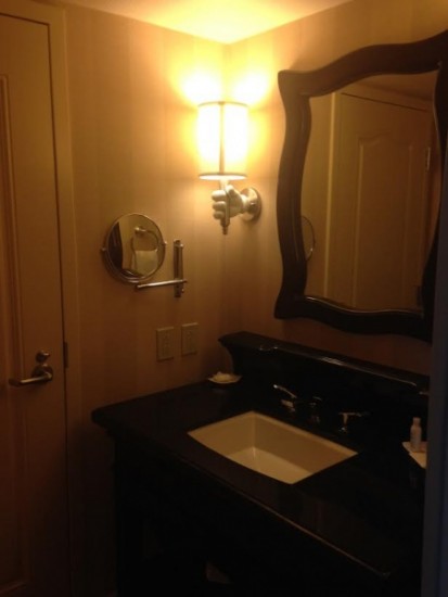 Light Fixture Mickey's hand holding the light fixture; I want this!