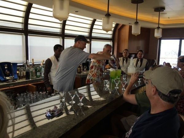 Mike behind the bar creating a rum martini!