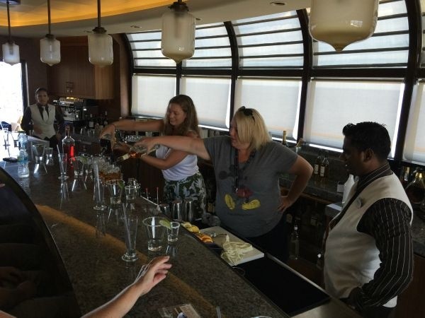 Pam Forrester Mixing Pam Forrester making a new drink for the group!