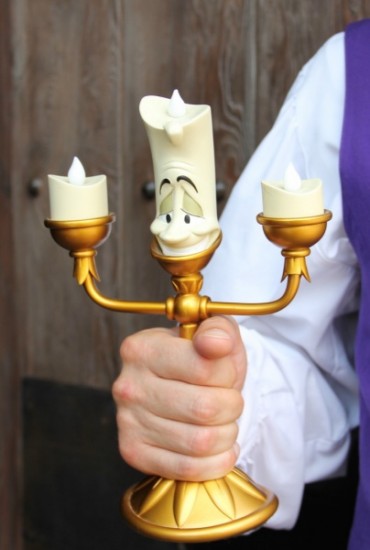 Lumiere Greeting Guests for Dinner at Be our Guest