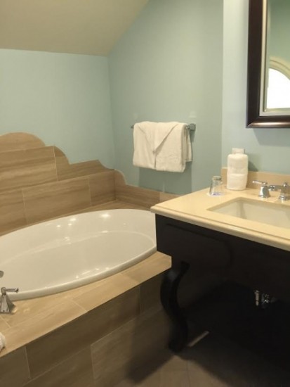bathroom Serene colors in the bathroom, and nice bathtub!