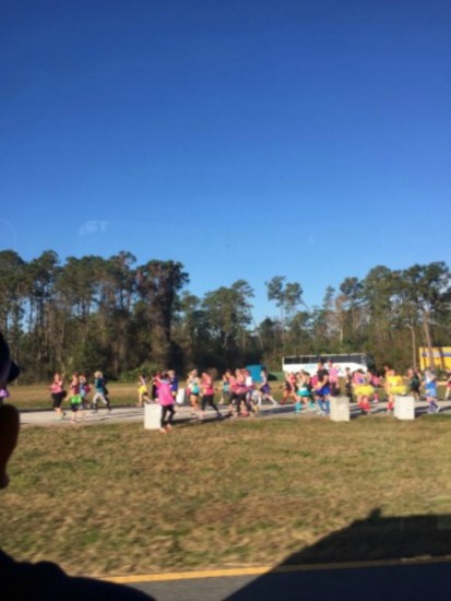 Runners from the bus at Magic Kingdom