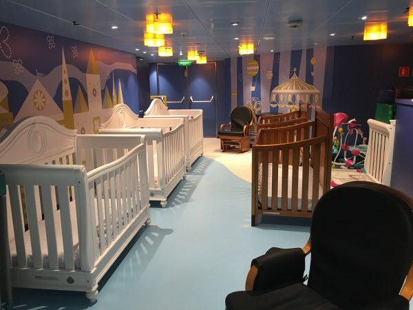 Disney Wonder - "it's a small world" nursery - crib area Crib Area