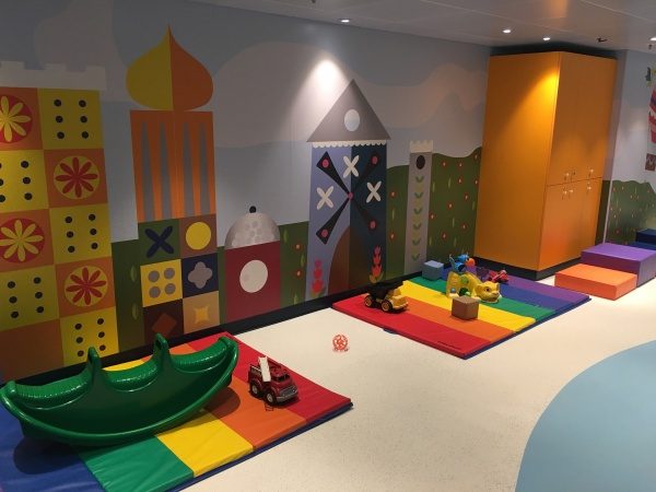 A colorful play area for infants and toddlers.