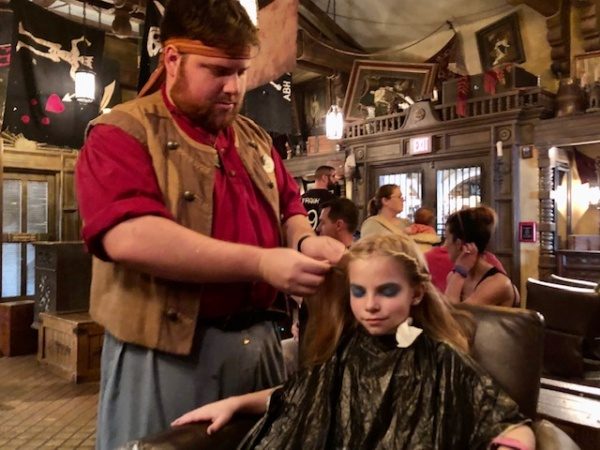 Pirate making pretty twists in hair Pirate making pretty twists in hair
