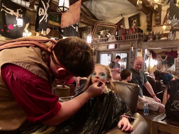 Pirate applying lipstick Pirate applying lipstick
