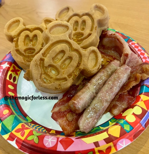 Mickey Waffles, bacon, and sausage Breakfast combo 