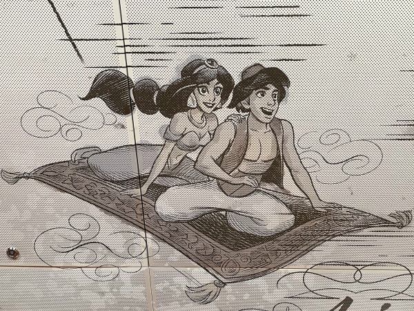 Aladdin & Jasmine take a magic carpet ride on the ceiling of the Keg & Compass on the Disney Wish