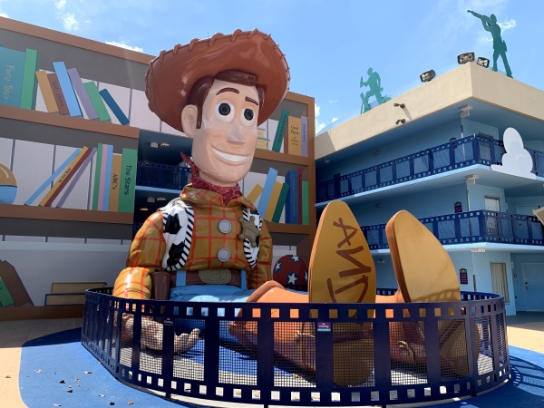 Two story tall statue of Woody from the movie Toy Story