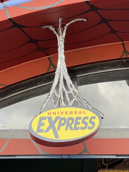 Express Pass entrance sign at The Amazing Adventures Spider-Man.