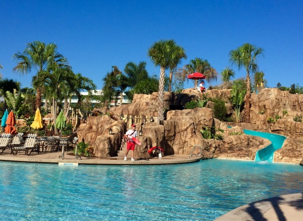 Pool and waterslide at Sapphire Falls Resort