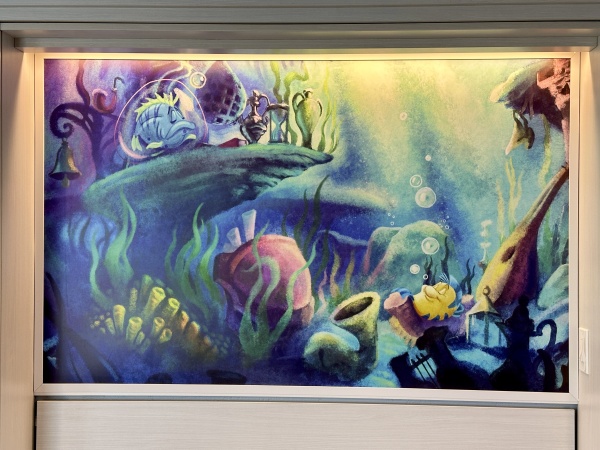 Little Mermaid Rooms at Disney's Caribbean Beach Resort Mural above pull down bed at 