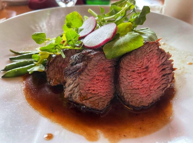 Beef Medallions beautifully displayed and ready to be enjoyed at Mythos restaurant.