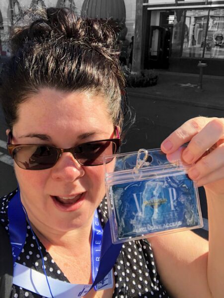 VIP credentials being held up by participant in Universal Studios Florida