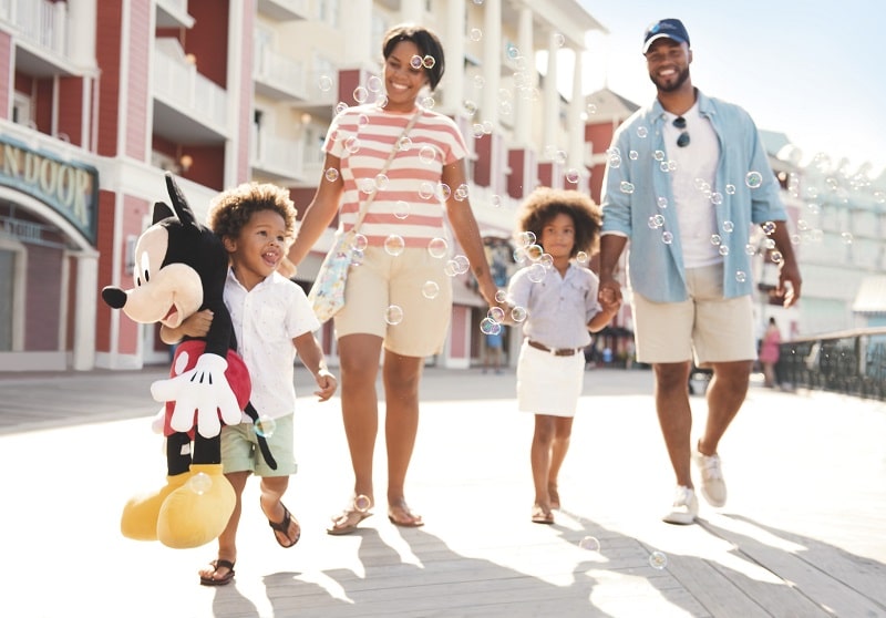 Family on Disney's Boardwalk - Walt Disney World 2025 Vacation Packages