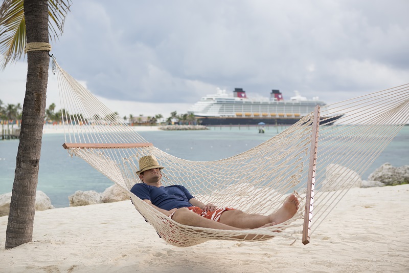 Disney Cruise Line Discounts for US Military Personnel - Relaxing on a Hammock at Disney's Castaway Cay