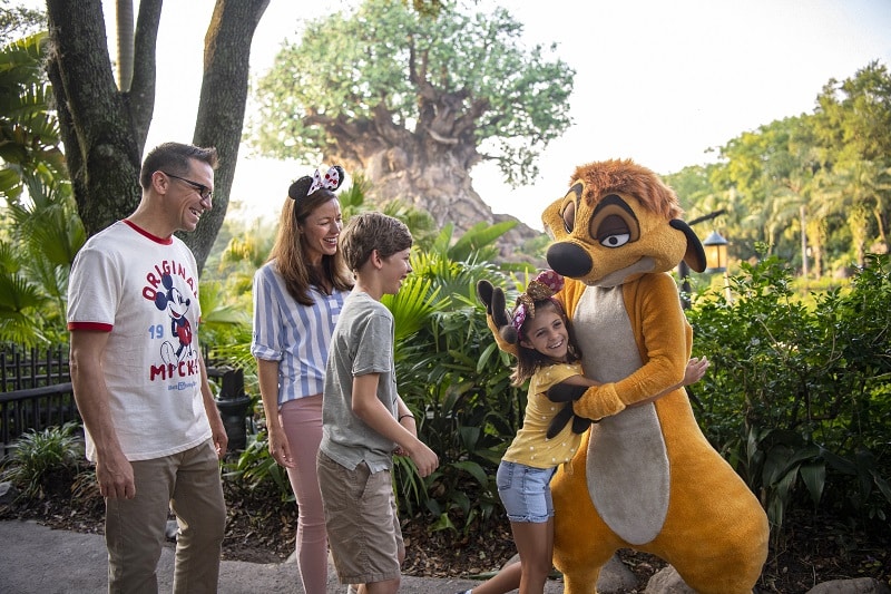 Timon with guests at Disney’s Animal Kingdom - Plan your 2026 Walt Disney World Vacation