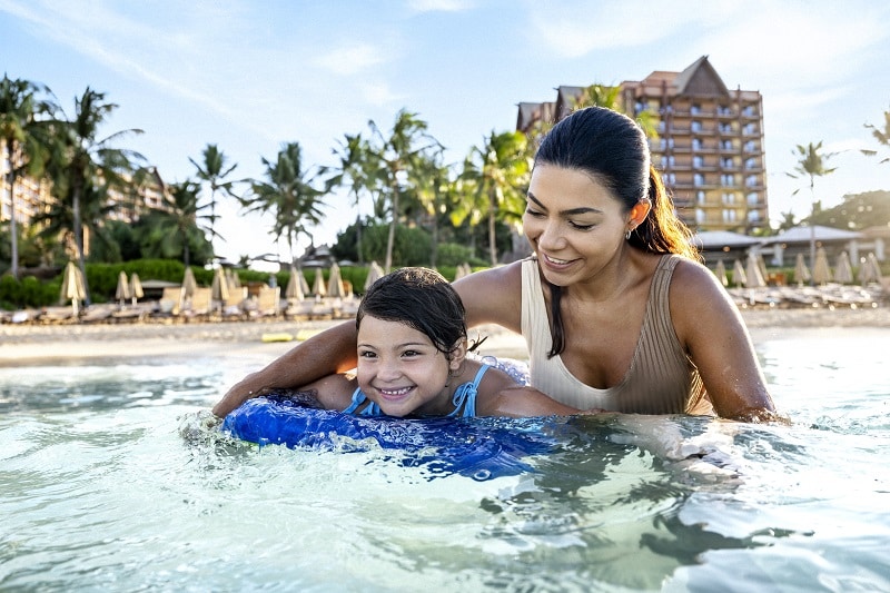 Aulani Resort Guests Swimming in Ocean