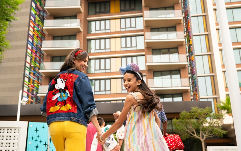 Guests capturing the joyful atmosphere of Disneyland Hotels.