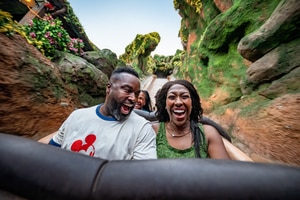 Guests riding Tiana's Bayou Adventure at Magic Kingdom
