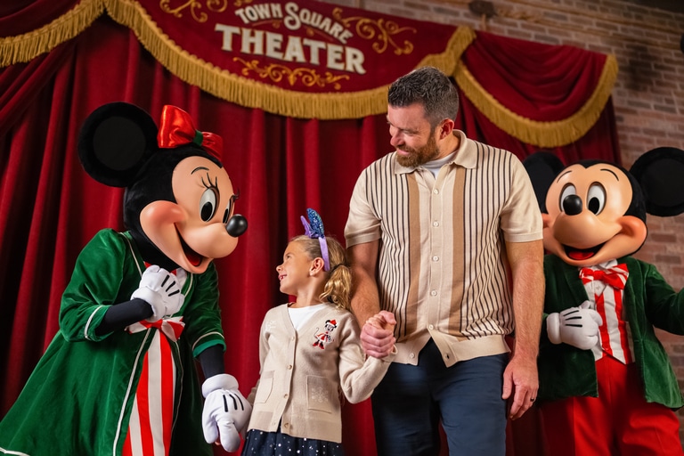 Festive Mickey and Minnie dressed for the Holidays
